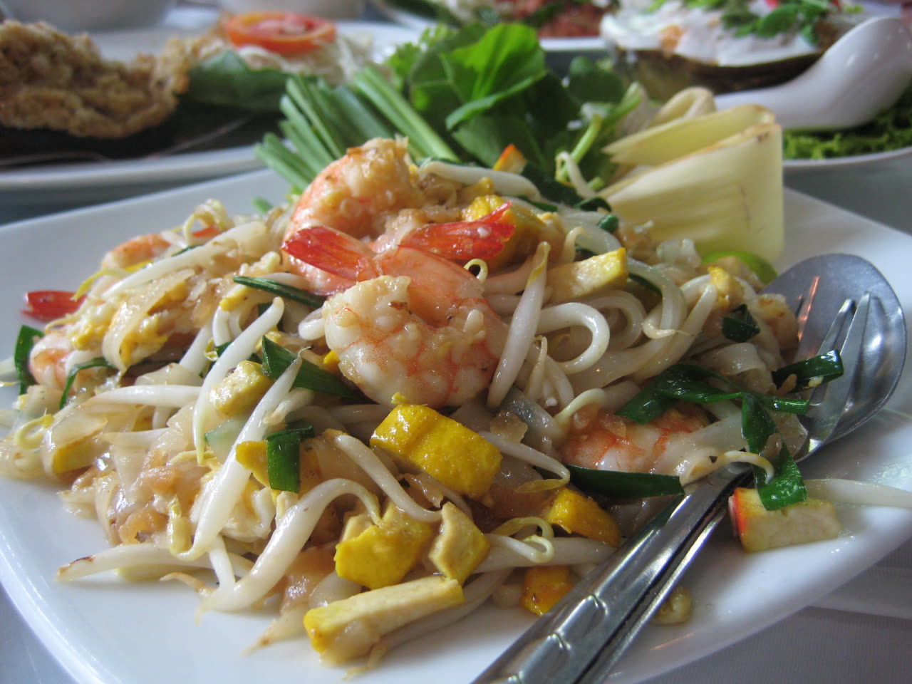 Pad Thai noodles with prawns, peanuts, and lime — a Chan Dara classic
